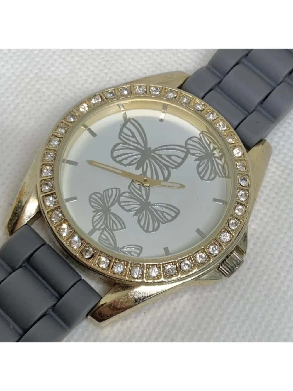 Butterflies dial gold tone watch 44mm large face rhinestone quartz gray running